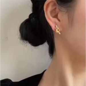 Gold Knotted Twisted Metal Stud Earrings